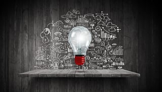 Light bulb and drawing business strategy at background.jpeg